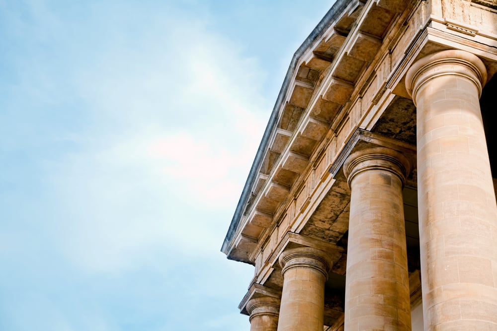 Front of an old greek or roman style law building